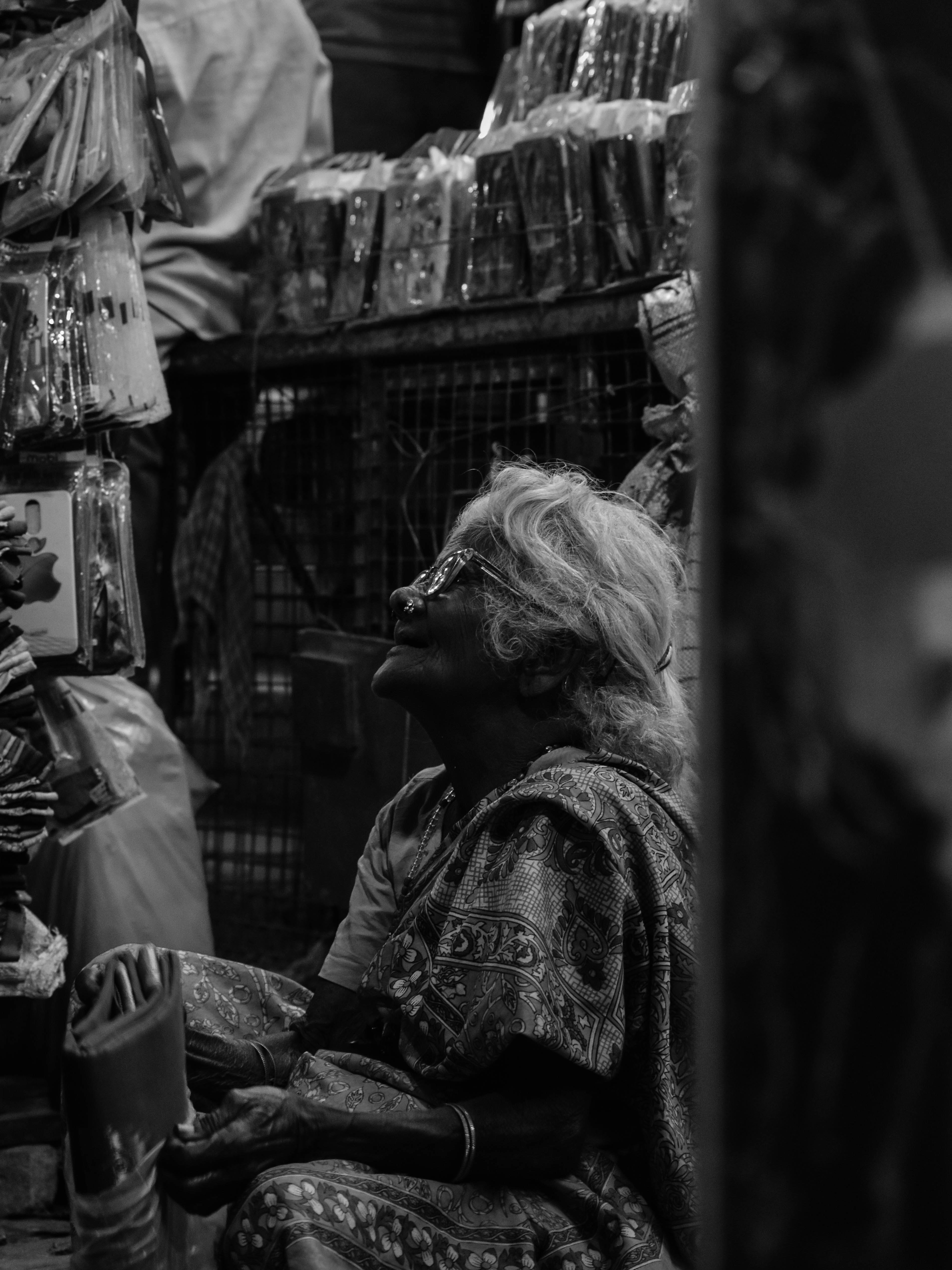 grayscale photography of woman wearing floral dress